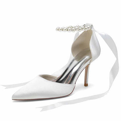 Elegant white heels with pearl ankle strap, perfect shoes for the wedding