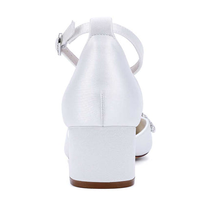 Elegant white wedding shoes with ankle strap and low block heel for comfort and style