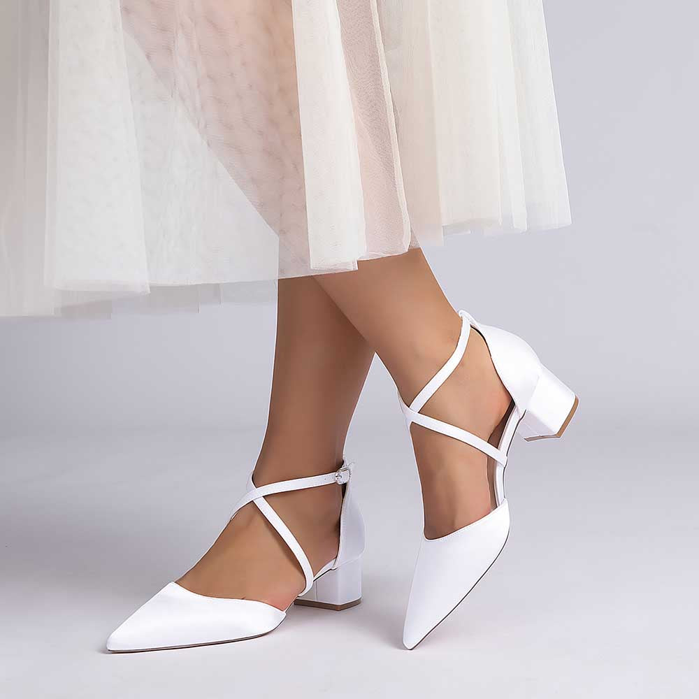 Elegant white wedding shoes with ankle strap and stylish block heel for bridal occasions