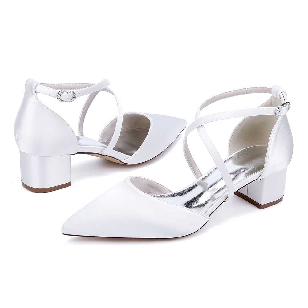 Elegant white wedding shoes with ankle strap featuring a stylish pointed toe and block heel