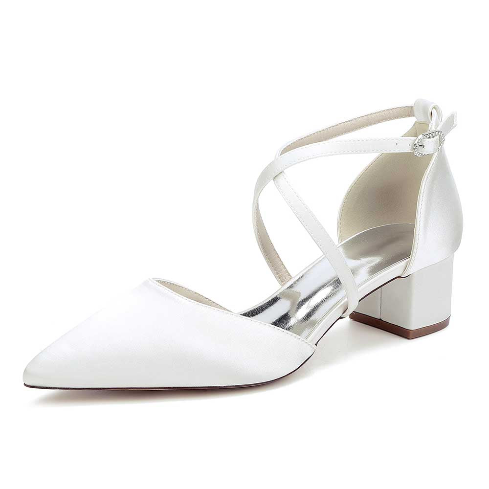Elegant white wedding shoes with ankle strap featuring a pointed toe and block heel