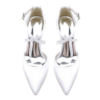 Elegant white wedding shoes with ankle strap and pointed toe design for brides