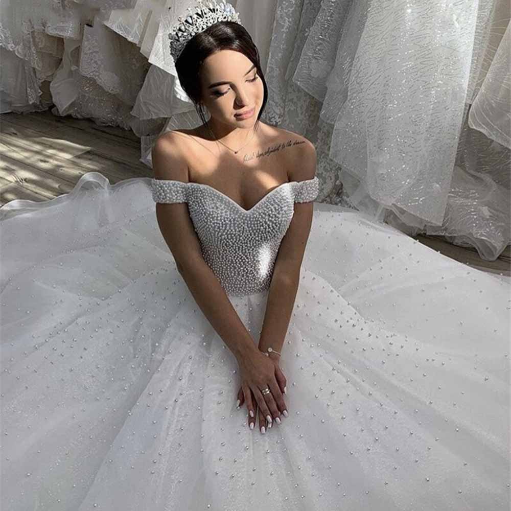 Off-the-Shoulder Sweep Train Tulle Wedding Dresses