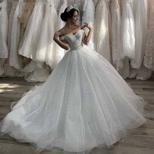 Off-the-Shoulder Sweep Train Tulle Wedding Dresses