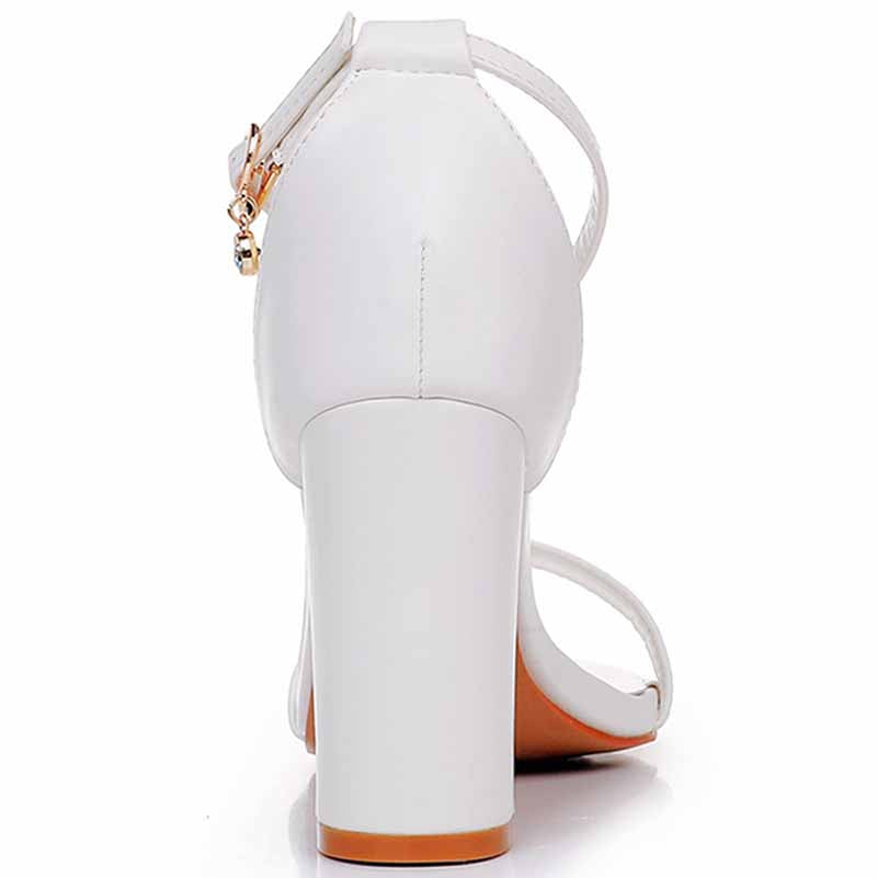 White ankle strap chunky heels from S&DCo. with a stylish design and comfortable fit