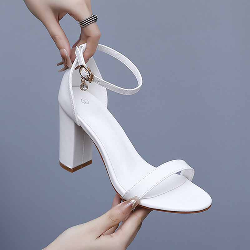 S&DCo. white ankle strap chunky heels with a stylish design for elegant occasions