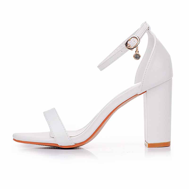 S&DCo. white ankle strap chunky heels featuring a stylish open toe and a sturdy block heel