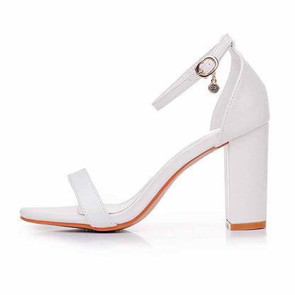 S&DCo. white ankle strap chunky heels featuring a stylish open toe and a sturdy block heel