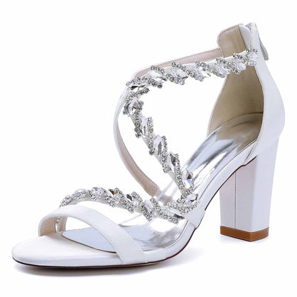 Elegant white crystal beaded heels for formal events with stylish straps and a block heel