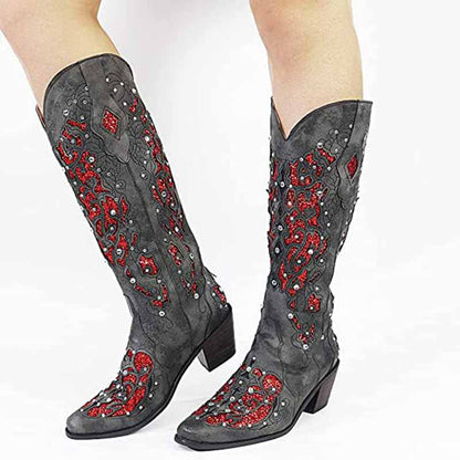 Stylish black wedding boots with red glitter designs, perfect for a fashionable look