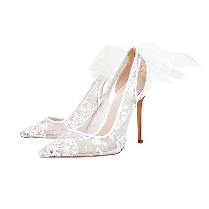 Elegant white lace bridal stilettos with a sleek design and charming bow detail for weddings