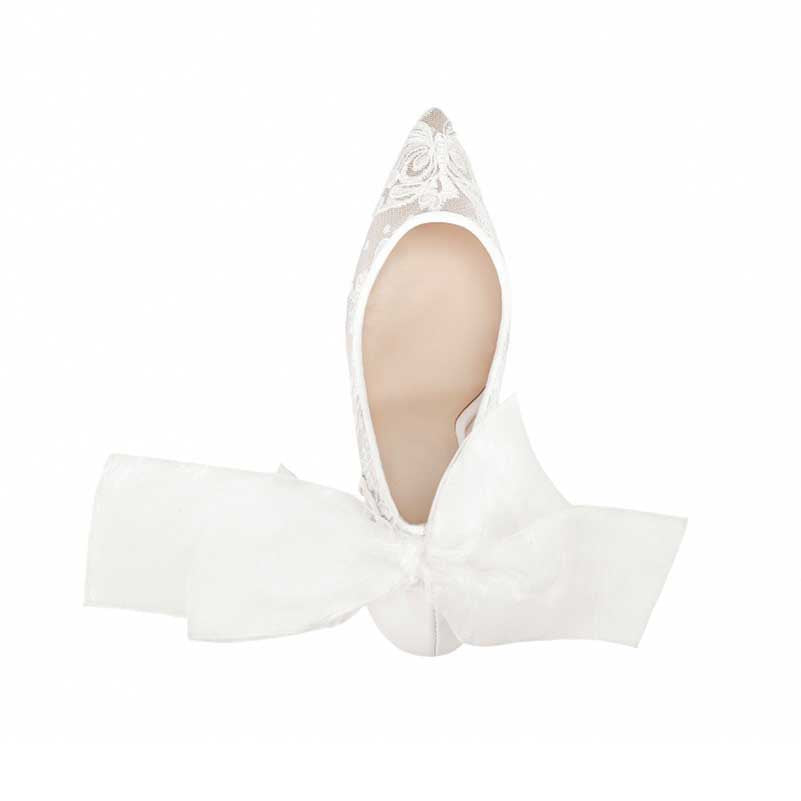 Elegant white lace bridal stilettos with a decorative bow for a stylish wedding look