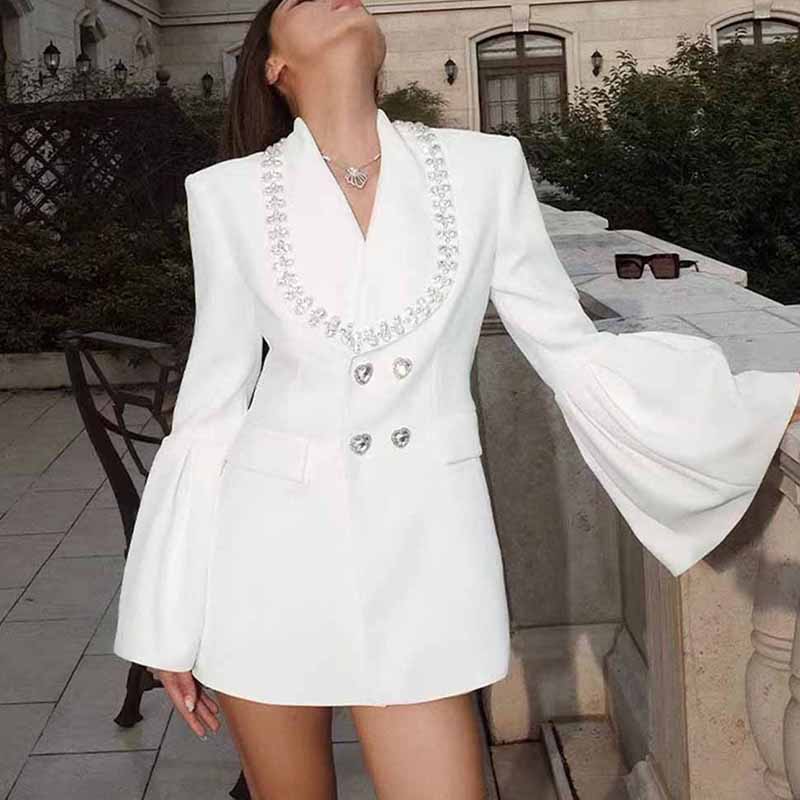 White sleeve jacket with stone details and puff sleeves