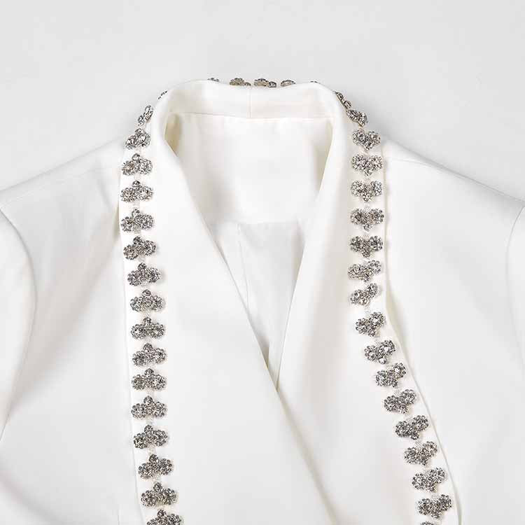 White sleeve jacket with stone details and puff sleeves