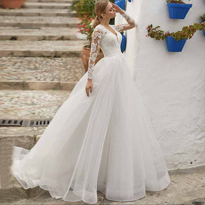 A-Line/Princess Tulle/Long Sleeve Zipper Wedding Dress With Appliqued