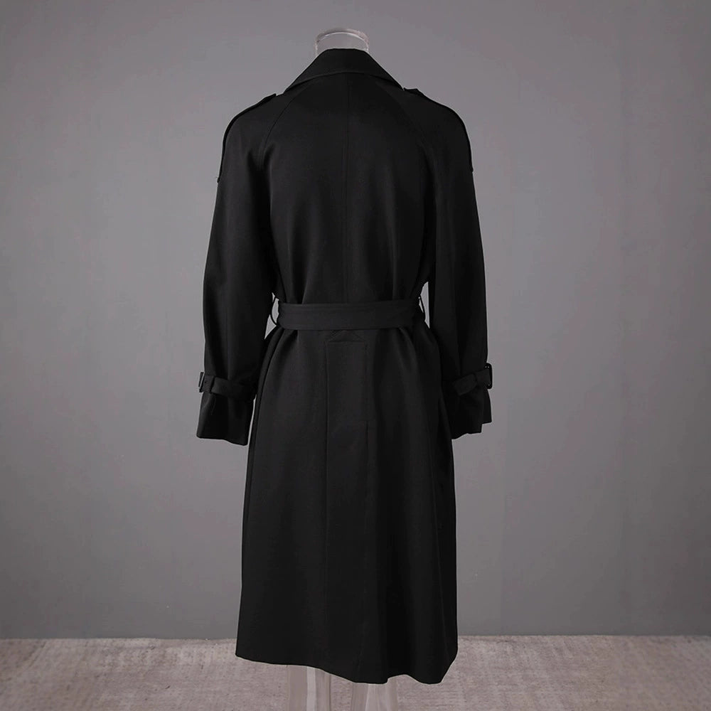 Black British style trench coat for women with a belted waist and classic silhouette