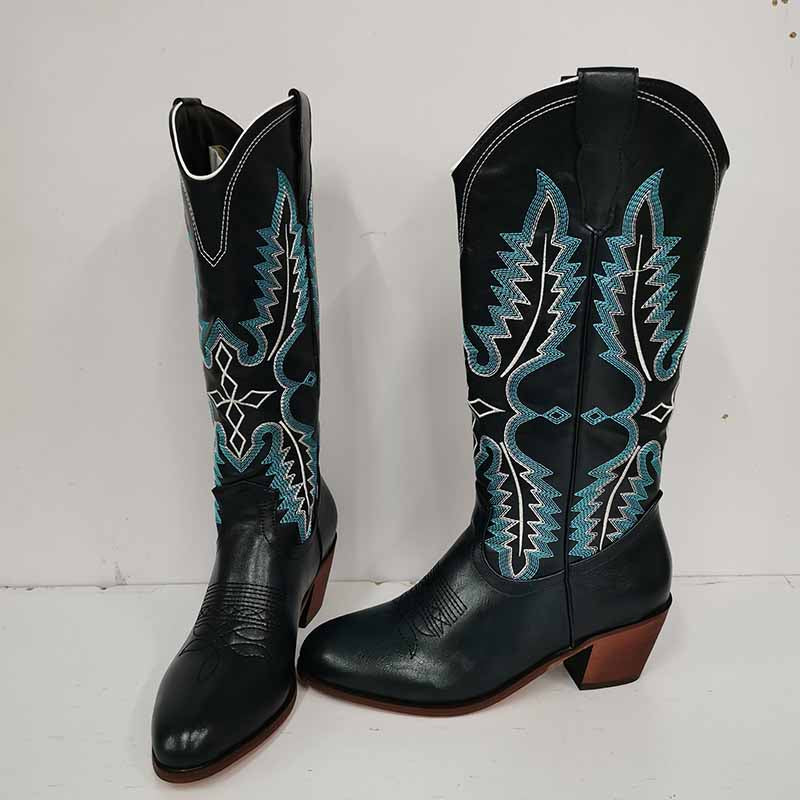 Women vintage cowboy boots in black leather with turquoise and white embroidery designs