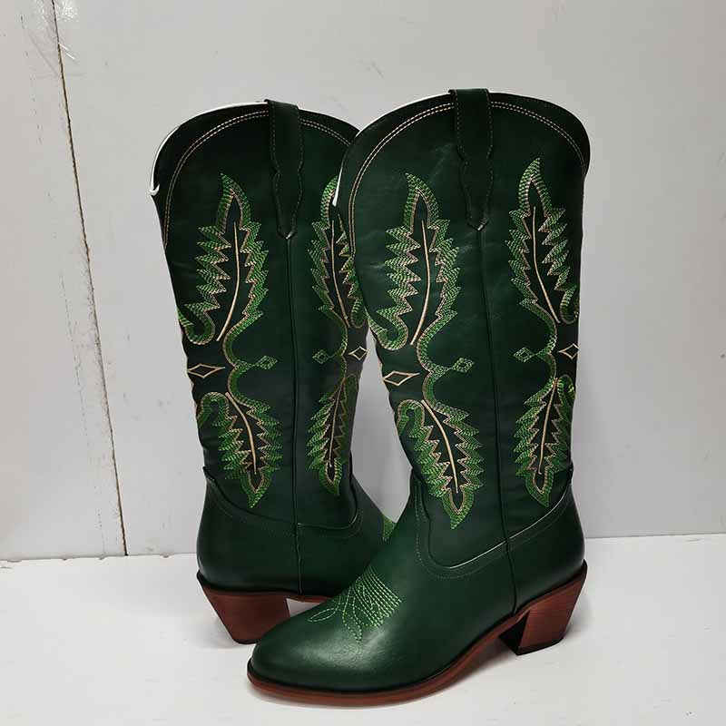 Women vintage cowboy boots in green with intricate stitching and stylish heel for a classic look
