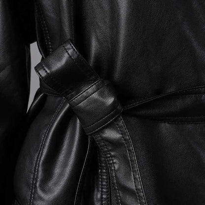 Close-up of women's belted leather jacket with pockets showcasing the stylish belt and texture