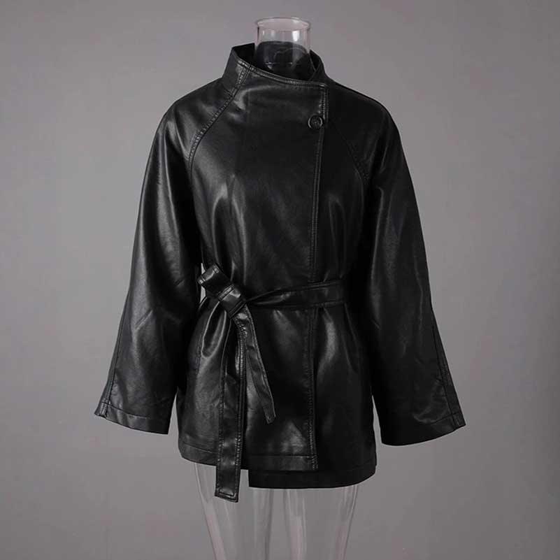 Stylish women's belted leather jacket with pockets, featuring a modern cut and sleek design