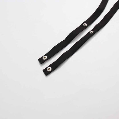 Close-up of black fabric straps for women's black belted winter coat by sd-hk