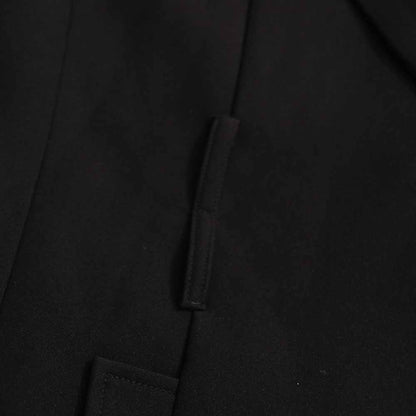 Close-up of sd-hk women's black belted winter coat showcasing the fabric and design details