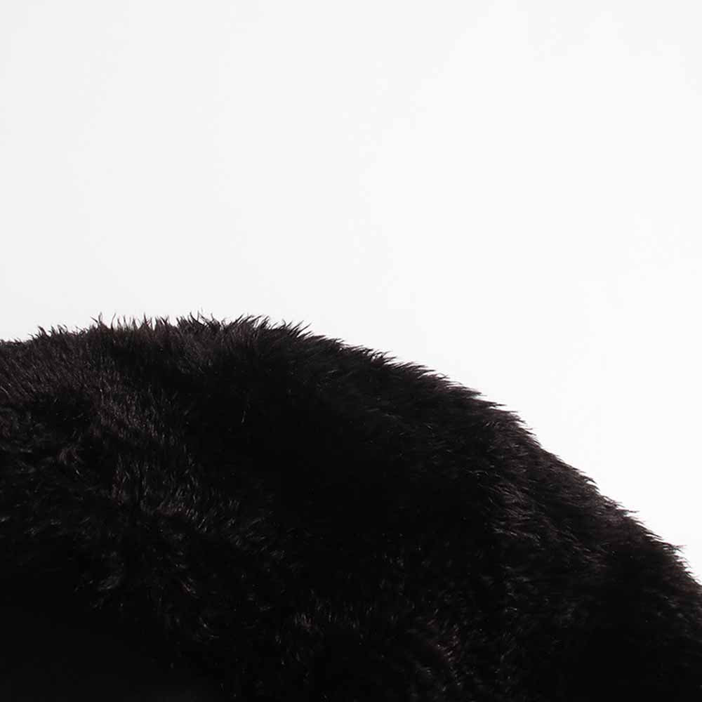 Close-up of women's black belted winter coat featuring a soft fur collar for added warmth and style