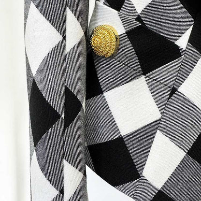 Close-up of women's black checked blazer coat featuring a stylish patterned design and button detail