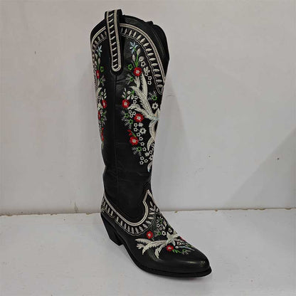 Women's black embroidered cowboy boots with floral designs and intricate stitching for stylish western wear