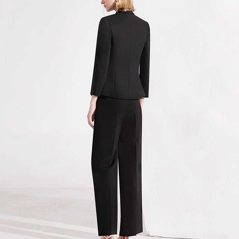 Elegant women's black formal pantsuit with a tailored fit and stylish design, perfect for professional occasions