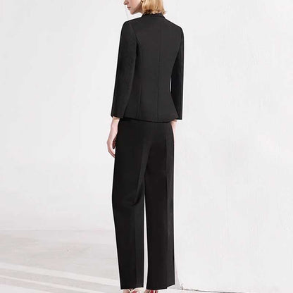 Elegant women's black formal pantsuit with a tailored fit and stylish design, perfect for professional occasions
