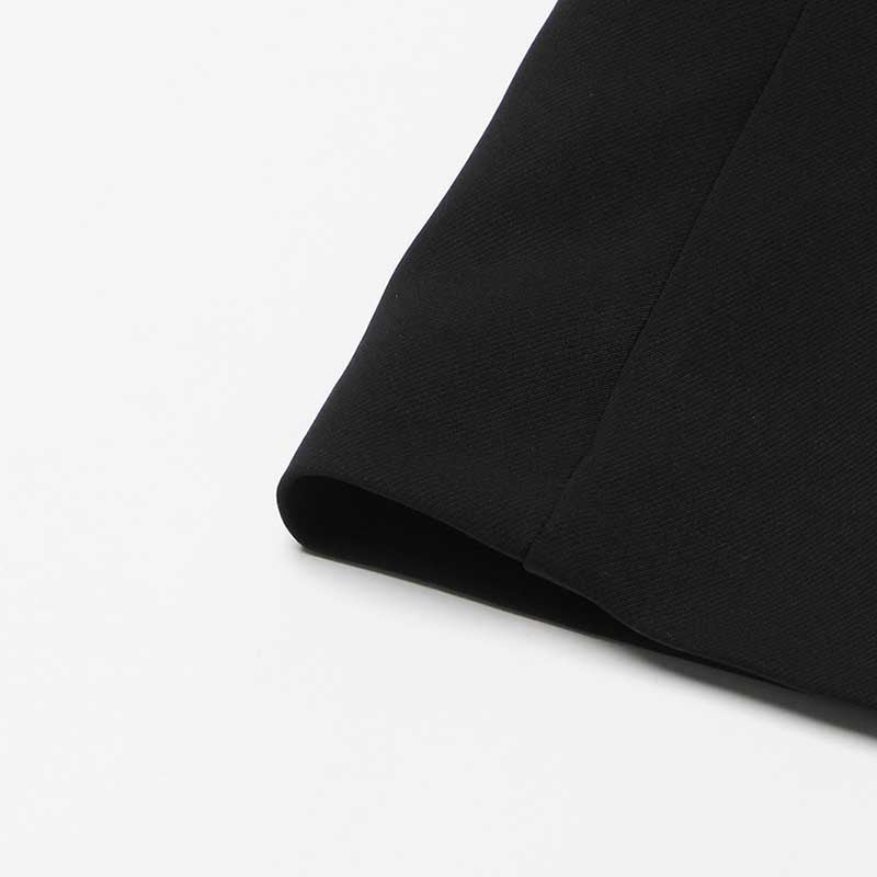 Detail of sd-hk women's black maxi blazer coat with a sleek fabric and tailored design