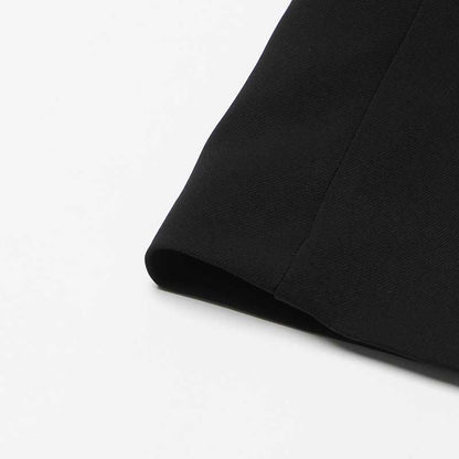 Detail of sd-hk women's black maxi blazer coat with a sleek fabric and tailored design