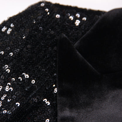 Close-up of women's black sequin blazer showcasing intricate sequins and elegant shawl collar