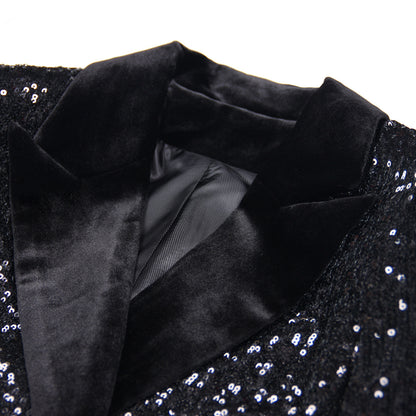Close-up of a women's black sequin blazer showcasing luxurious fabric and elegant design details