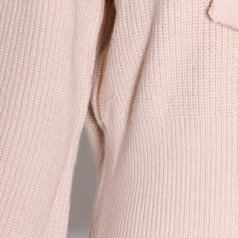 Light pink women's bow detail sweater with textured fabric for a cozy and stylish look