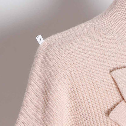 Soft pink women's bow detail sweater with a cozy texture and stylish design