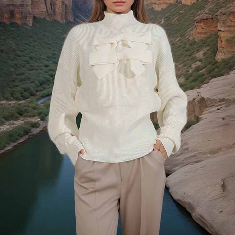 Elegant women's bow detail sweater in cream with ruffle accents for stylish layering
