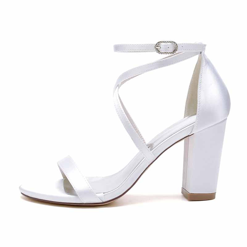 White women's chunky heel ankle strap sandals with a stylish design for elegant occasions