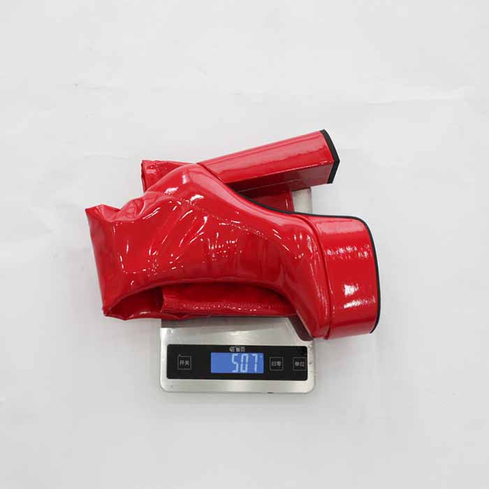 Women's chunky heel over the knee boots in red showcasing a sleek design and modern style