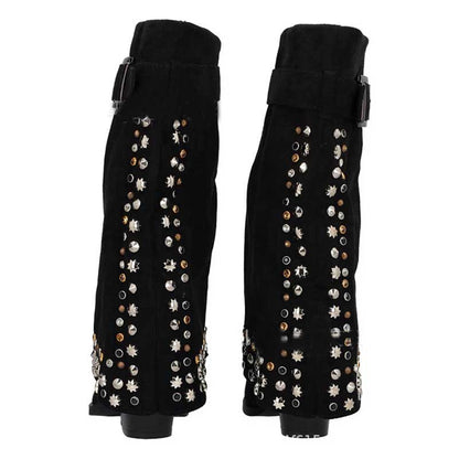 Stylish women's chunky heeled suede boots featuring decorative studs and a trendy design