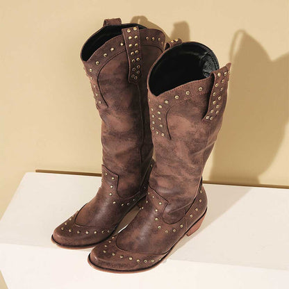 Brown women's country western boots with studded detailing and a stylish design