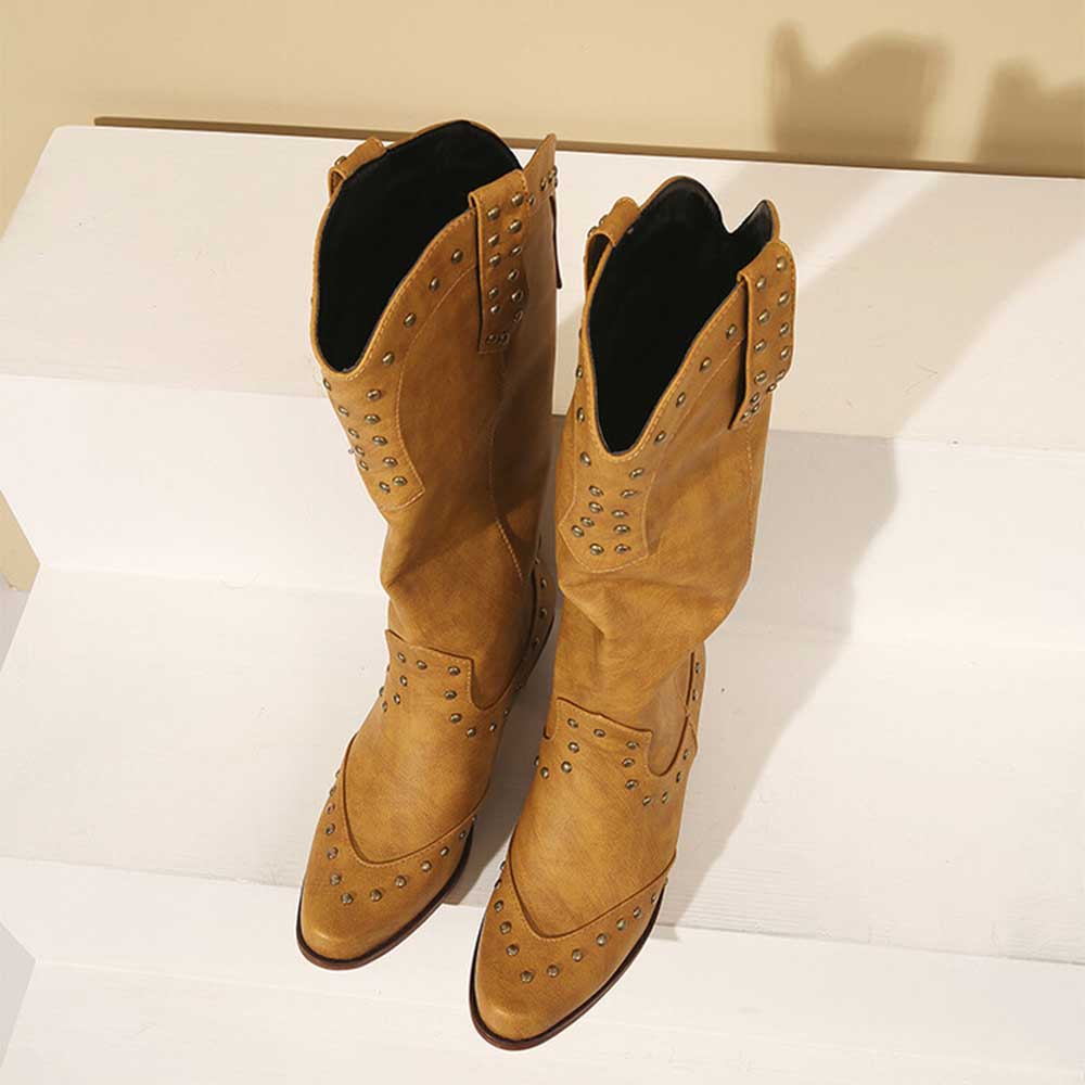 Stylish women's country western boots in tan with studded details and pointed toes