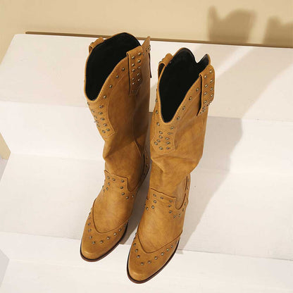 Stylish women's country western boots in tan with studded details and pointed toes