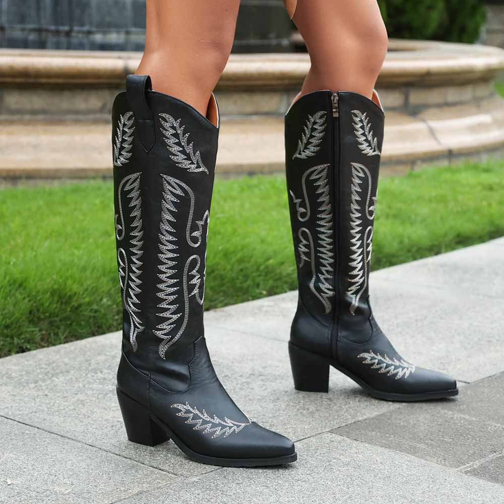 Stylish women's cowboy boots low heel with intricate stitching and pointed toe design in black