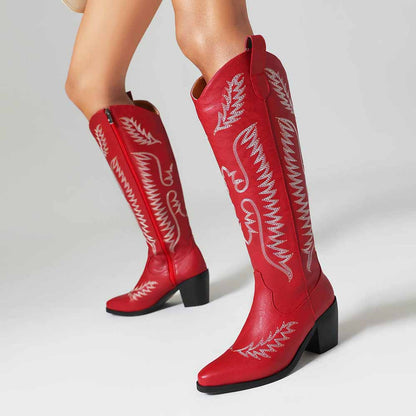 Stylish red women's cowboy boots low heel with decorative stitching and a sleek design