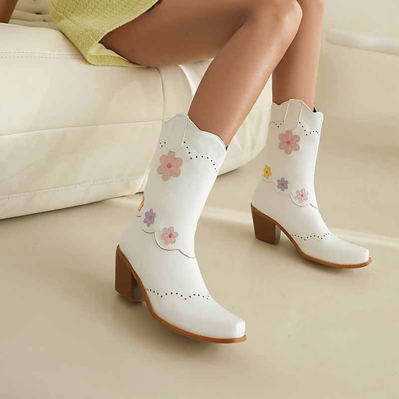 Women's cute mid-calf western boots with colorful floral designs and a stylish heel