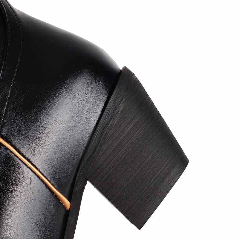 Black women's embroidered cowboy boots with stylish stitching and a comfortable heel