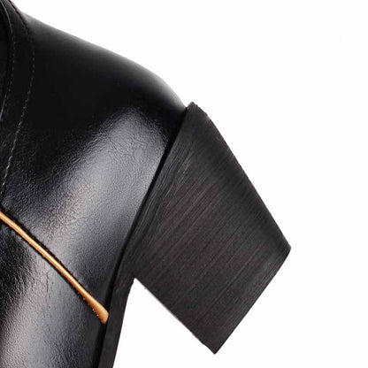 Black women's embroidered cowboy boots with stylish stitching and a comfortable heel