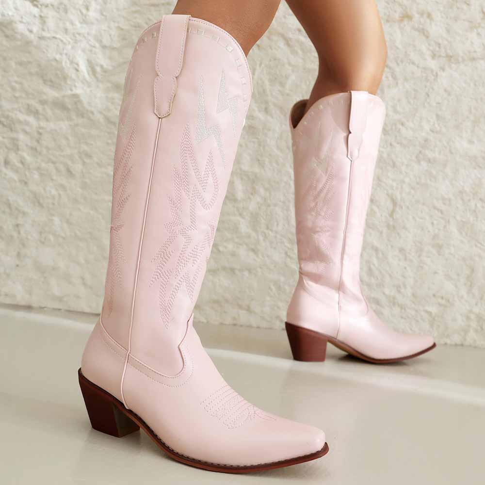 Stylish women's embroidered cowboy boots in pink with a sleek design and classic silhouette